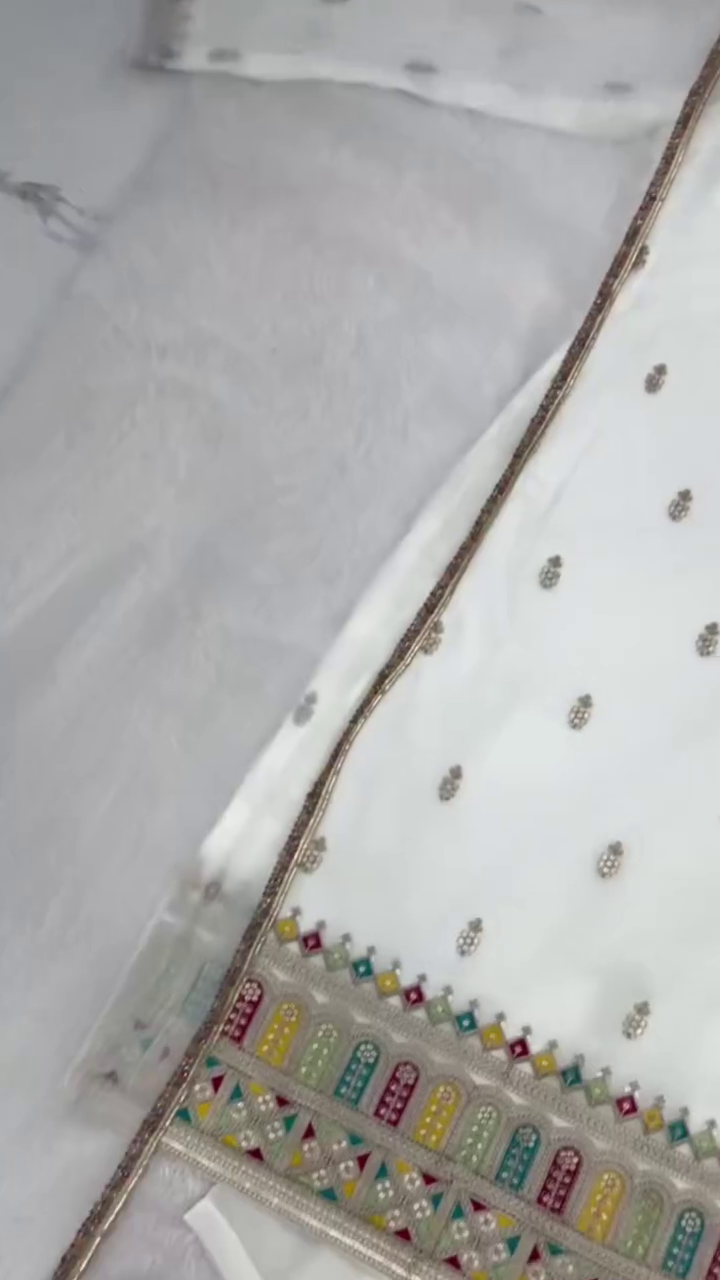 Elegant White Embroidered Suit – Graceful Festive Charm