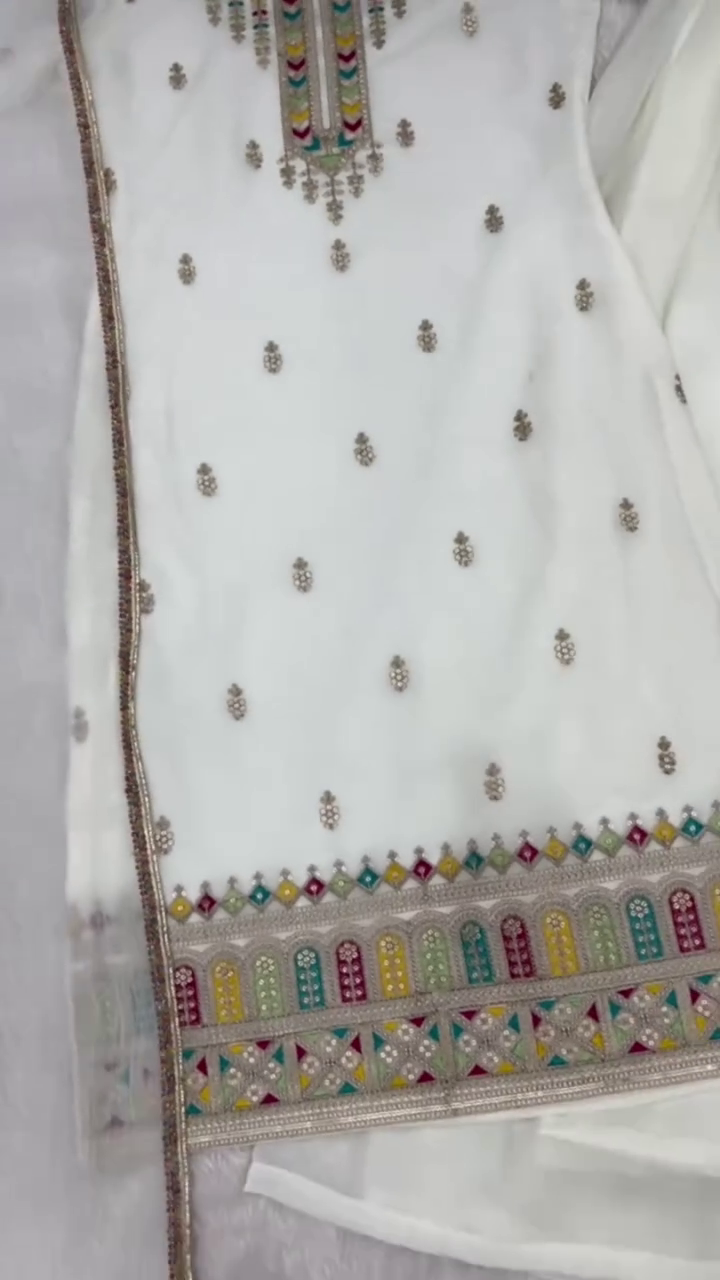 Elegant White Embroidered Suit – Graceful Festive Charm