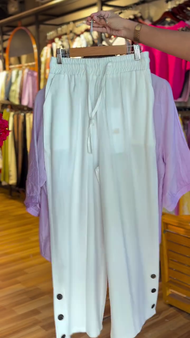 Elegant Off-White Wide-Leg Pants with Button Detail